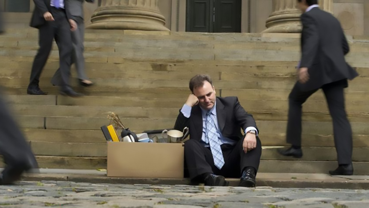 Banker sitting on the street